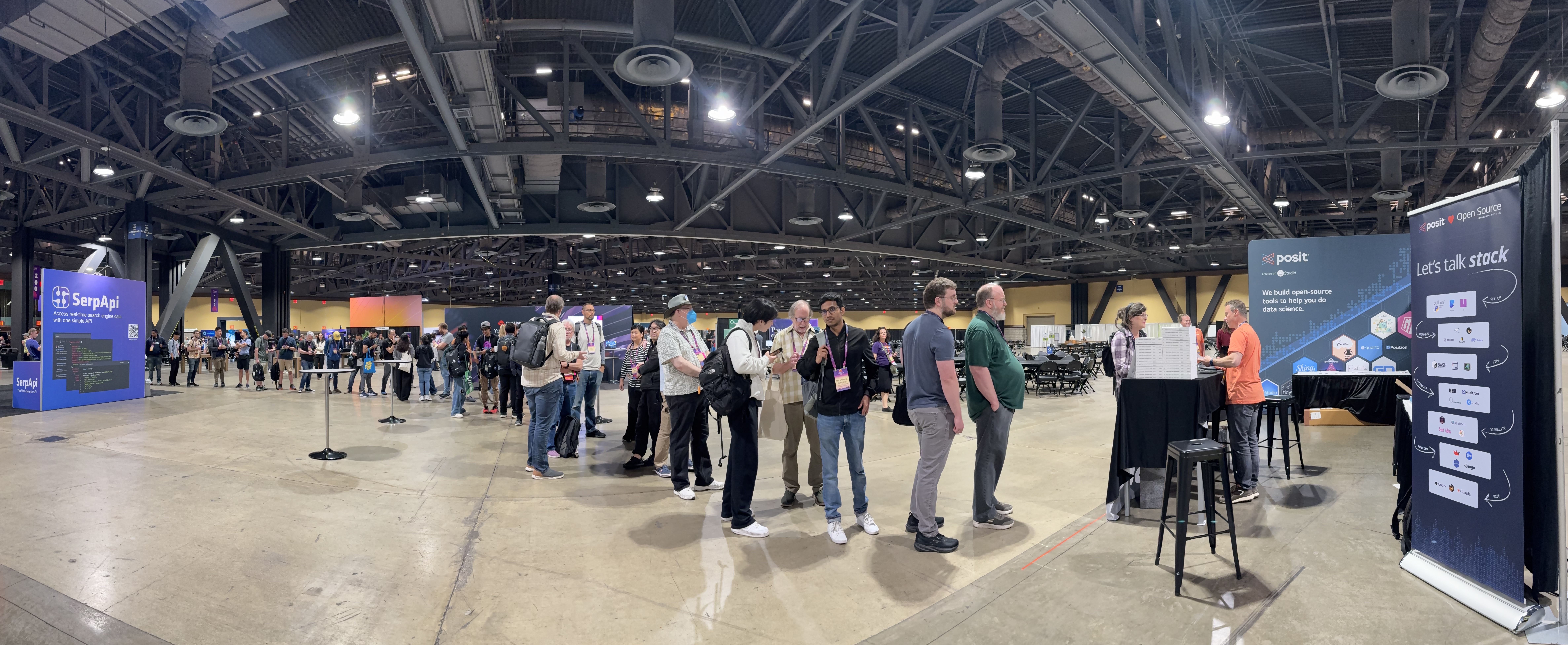 A long line of conference attendees waiting at Jeroen’s book signing booth in PyCon US’ large convention hall
